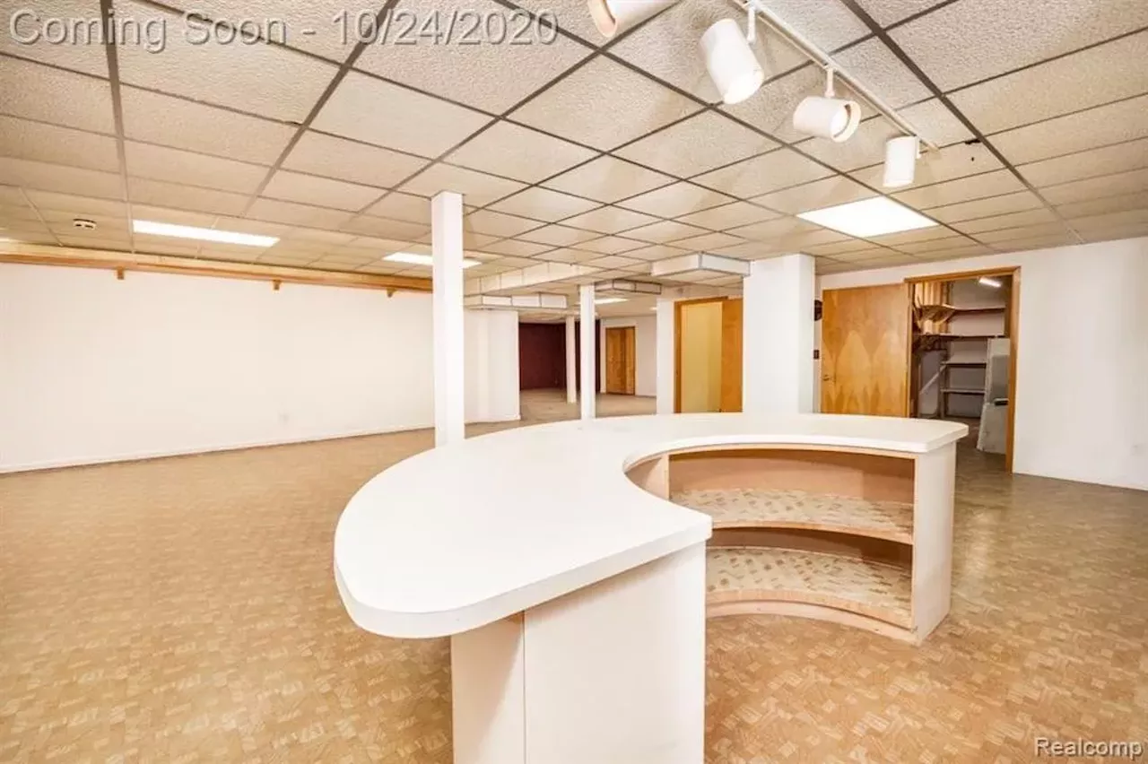 Image: This $550k metro Detroit home designed by the Palace architects has an indoor koi pond