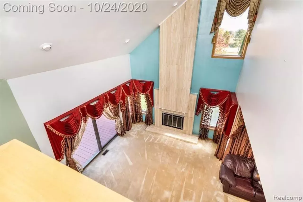 Image: This $550k metro Detroit home designed by the Palace architects has an indoor koi pond