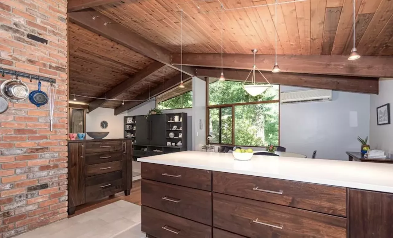 Image: This $585k zen AF Ann Arbor home has a pergola and koi pond
