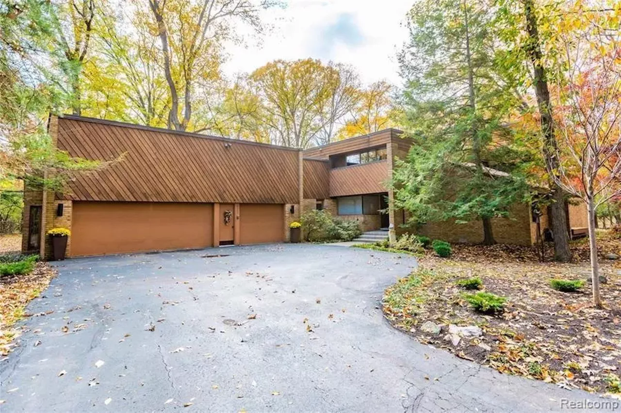 Image: This custom $649k home in Grosse Ile has a fabulous conversation pit