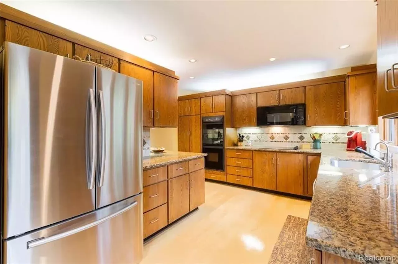 Image: This custom $649k home in Grosse Ile has a fabulous conversation pit