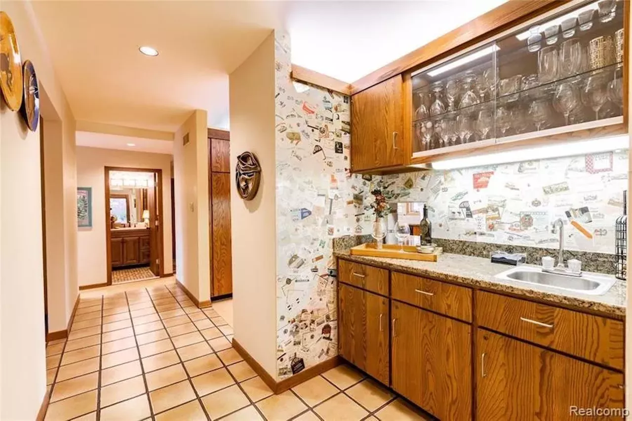 Image: This custom $649k home in Grosse Ile has a fabulous conversation pit