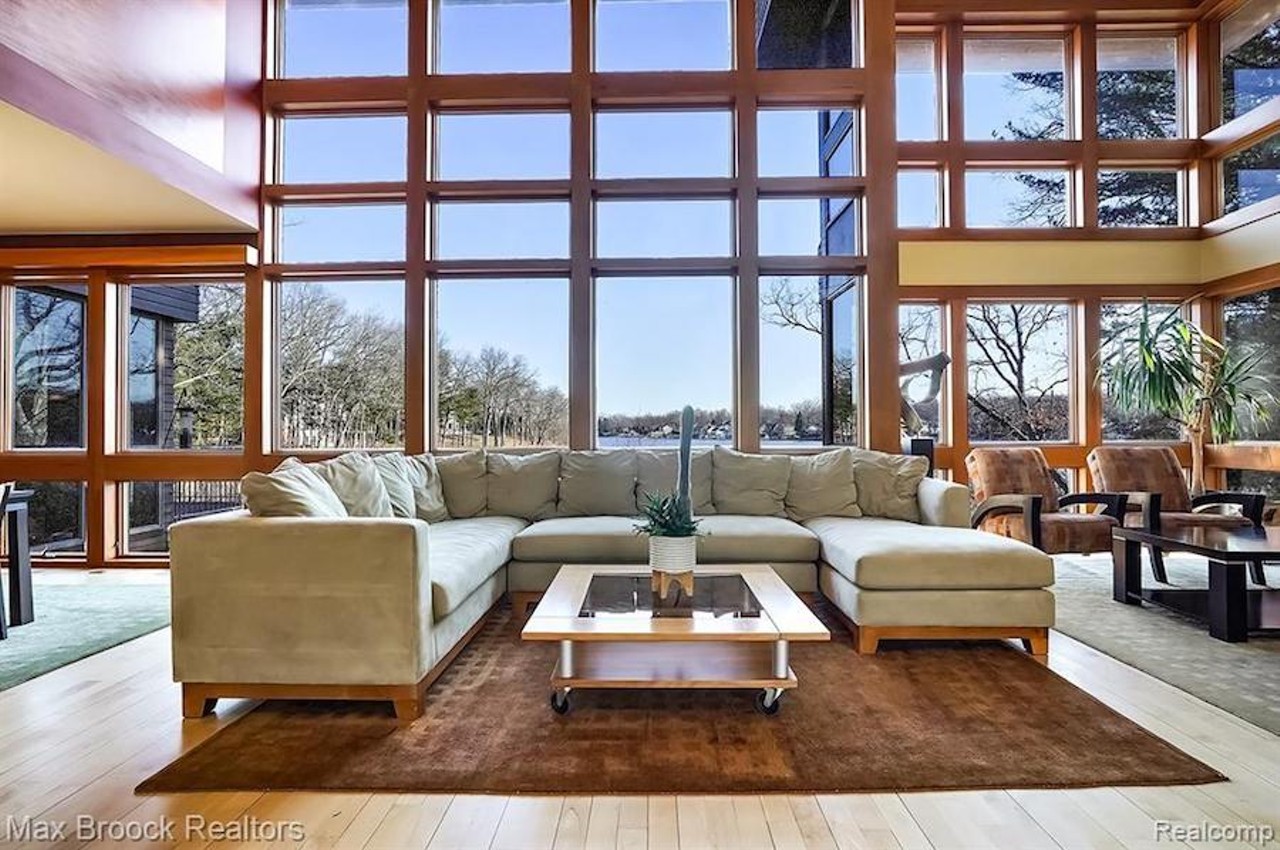 This custom 'organic contemporary' home on Michigan's Blain Island has strong Y2K energy