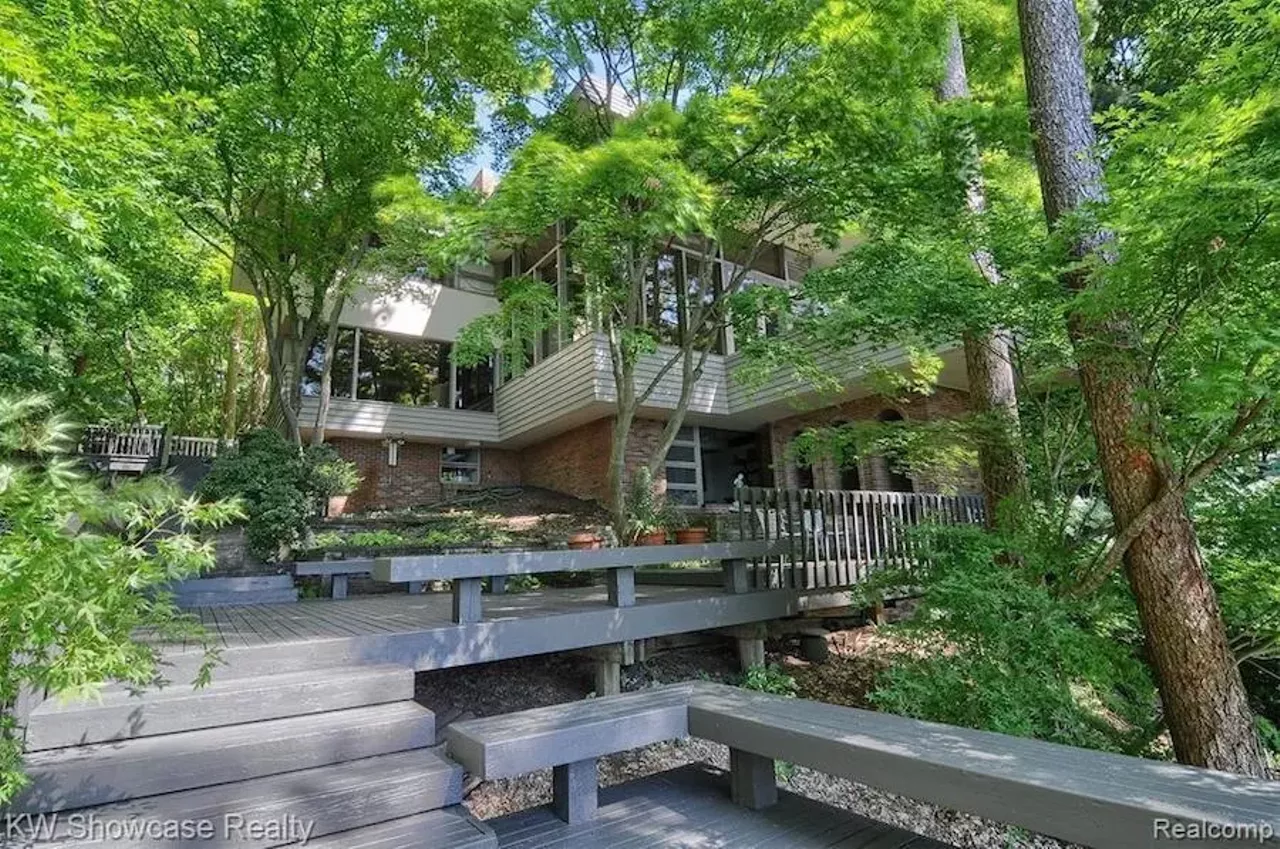 Image: This Frank Lloyd Wright-inspired waterfront home in Michigan has an artist loft, atrium, and waterfall