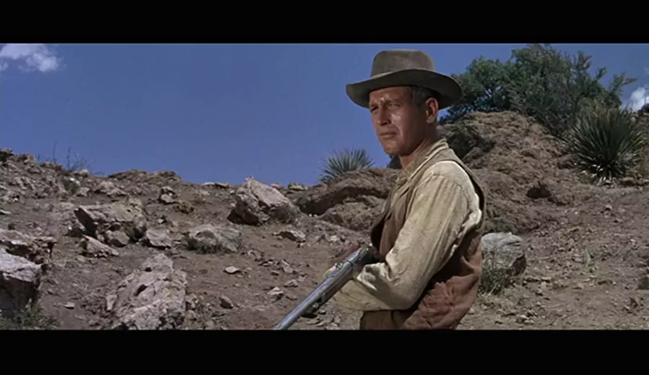 Hombre (1967) Directed by Martin Ritt. Written by Irving Ravetch and Harriet Frank Jr. Produced by Martin Ritt and Irving Ravetch. Based on the fifth and final novel of Leonard’s early Western phase, published in 1961, the film stars Paul Newman as John Russell, a white man raised by Indigenous American who experiences racism because of his background. It received generally favorable reviews, thanks to portraying Indigenous Americans in a more positive light than typically seen in Westerns.