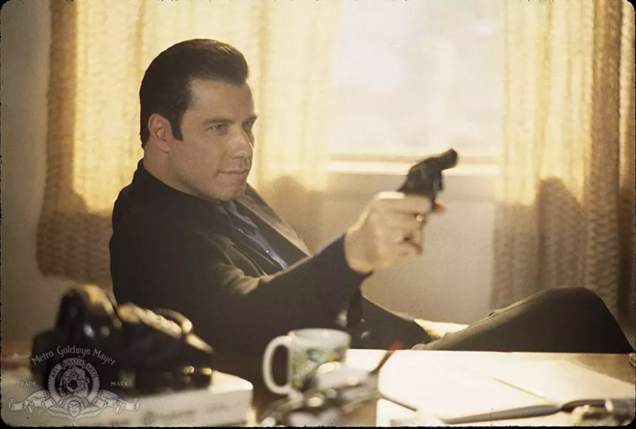 Get Shorty (1995) Directed by Barry Sonnenfeld. Written by Scott Frank. Produced by Danny DeVito, Michael Shamberg, and Stacey Sher. Quite possibly the best film based on Leonard’s work, Get Shorty was praised for its star-studded cast (featuring John Travolta, Gene Hackman, Rene Russo, Delroy Lindo, James Gandolfini, Dennis Farina, and Danny DeVito) and its searing postmodern satire of show business. It was based on Loenard’s 1990 novel, his 28th, about Ernest “Chili” Palmer, a real-life Miami loan shark played by Travolta who earned a Golden Globe (Best Actor in a Comedy or Musical) for his performance.