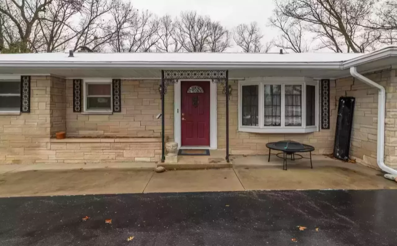 This Kalamazoo house comes with an indoor pool, sauna, and tree fort