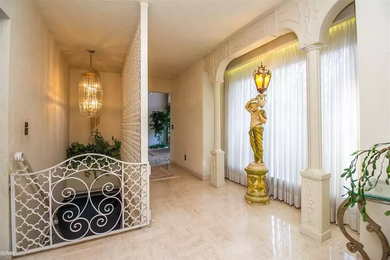 Image: This retro $597k home in Clinton Township has a mirrored indoor koi pond &#151;&nbsp;and we are speechless