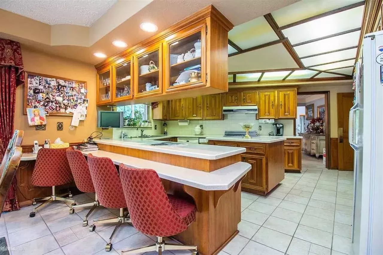 Image: This retro $597k home in Clinton Township has a mirrored indoor koi pond &#151;&nbsp;and we are speechless