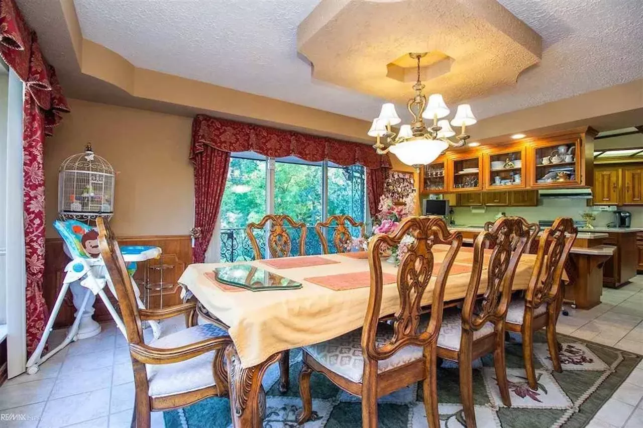 Image: This retro $597k home in Clinton Township has a mirrored indoor koi pond &#151;&nbsp;and we are speechless