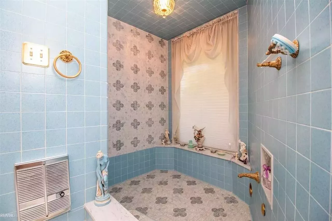 Image: This retro $597k home in Clinton Township has a mirrored indoor koi pond &#151;&nbsp;and we are speechless
