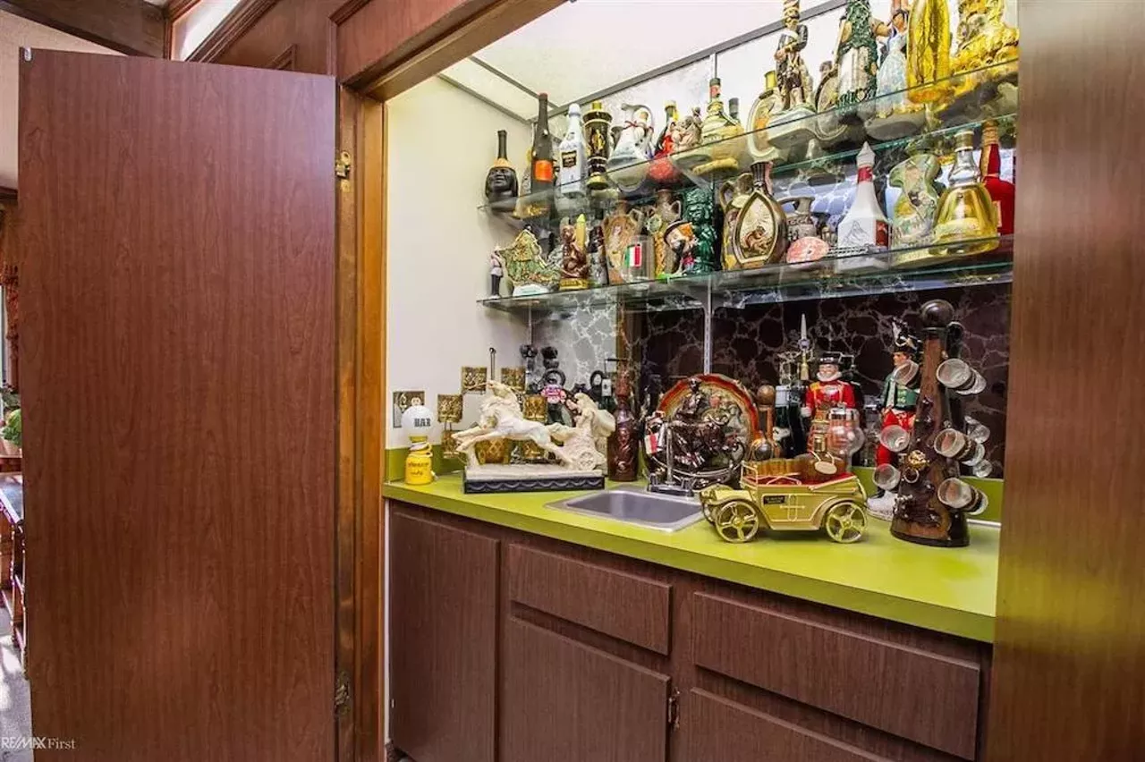 Image: This retro $597k home in Clinton Township has a mirrored indoor koi pond &#151;&nbsp;and we are speechless