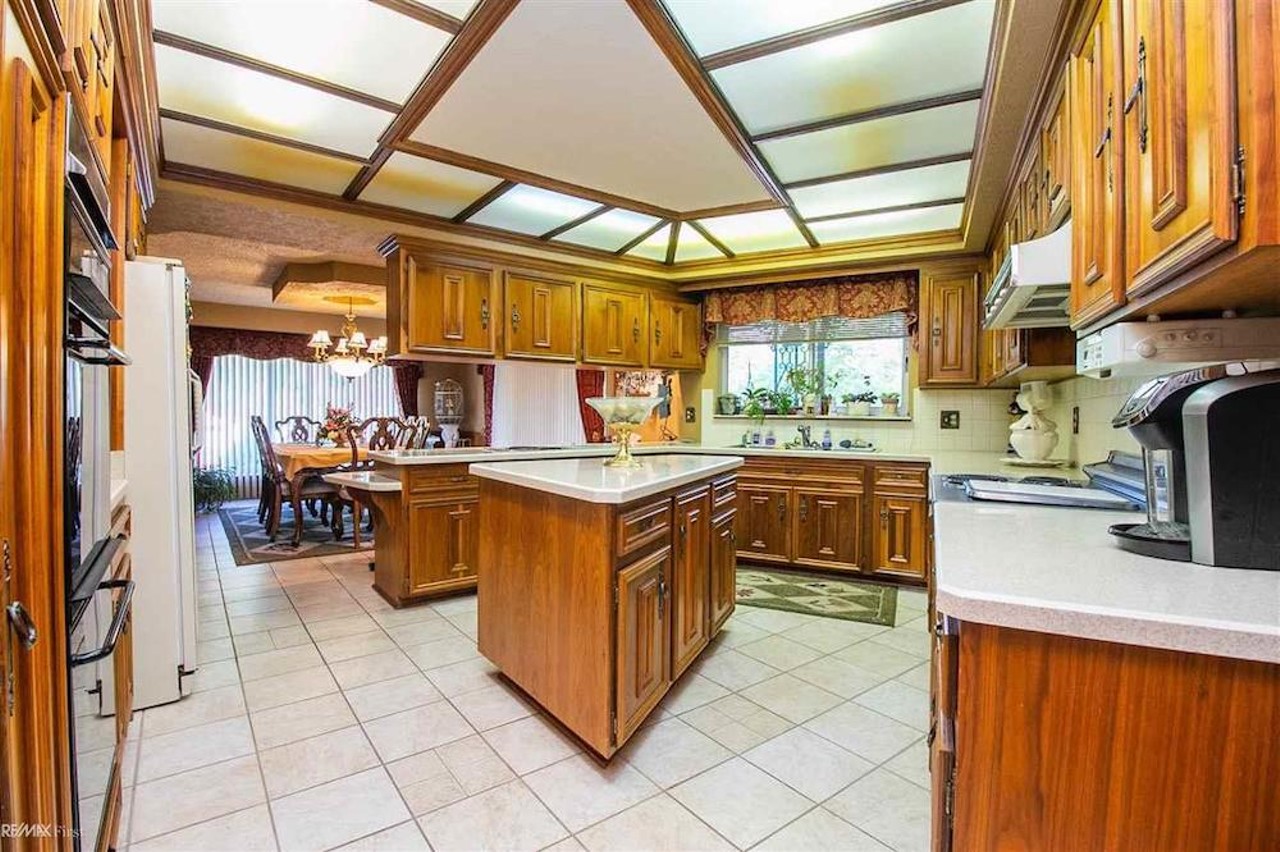 This retro $597k home in Clinton Township has a mirrored indoor koi pond &#151;&nbsp;and we are speechless