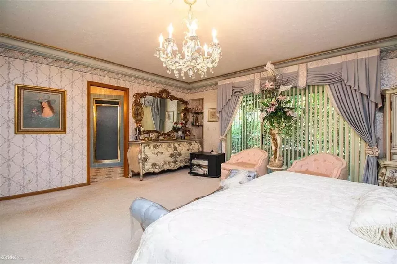 Image: This retro $597k home in Clinton Township has a mirrored indoor koi pond &#151;&nbsp;and we are speechless