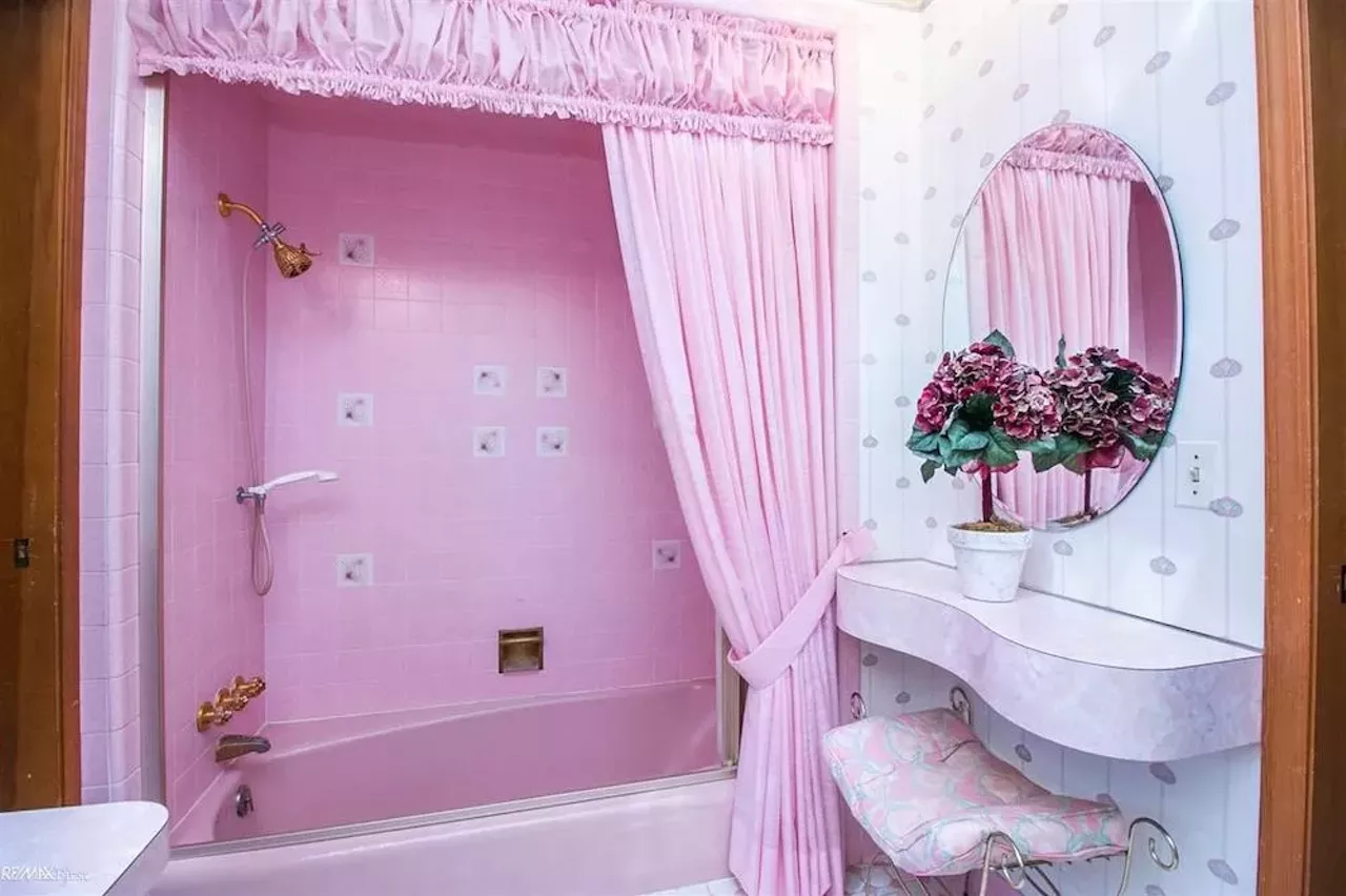 Image: This retro $597k home in Clinton Township has a mirrored indoor koi pond &#151;&nbsp;and we are speechless