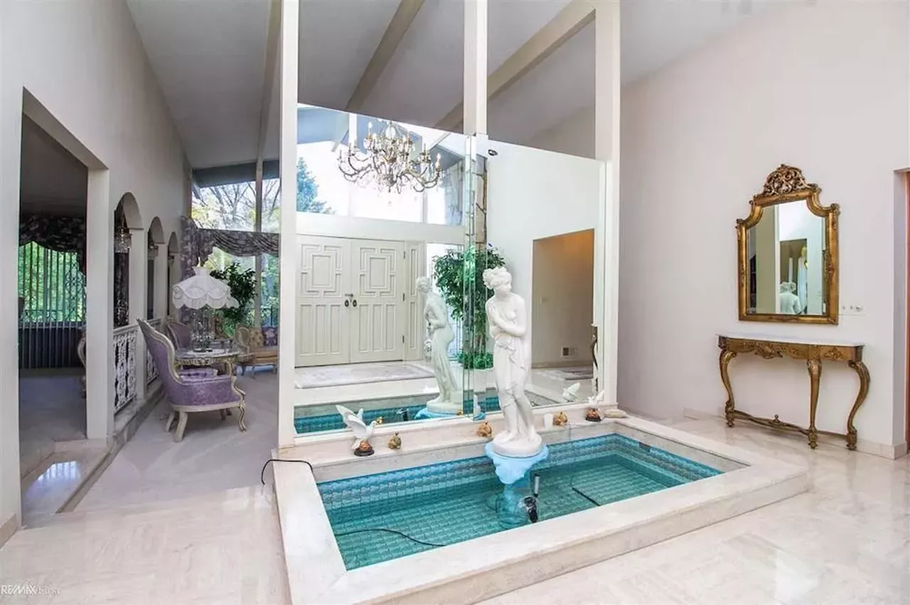 Image: This retro $597k home in Clinton Township has a mirrored indoor koi pond &#151;&nbsp;and we are speechless