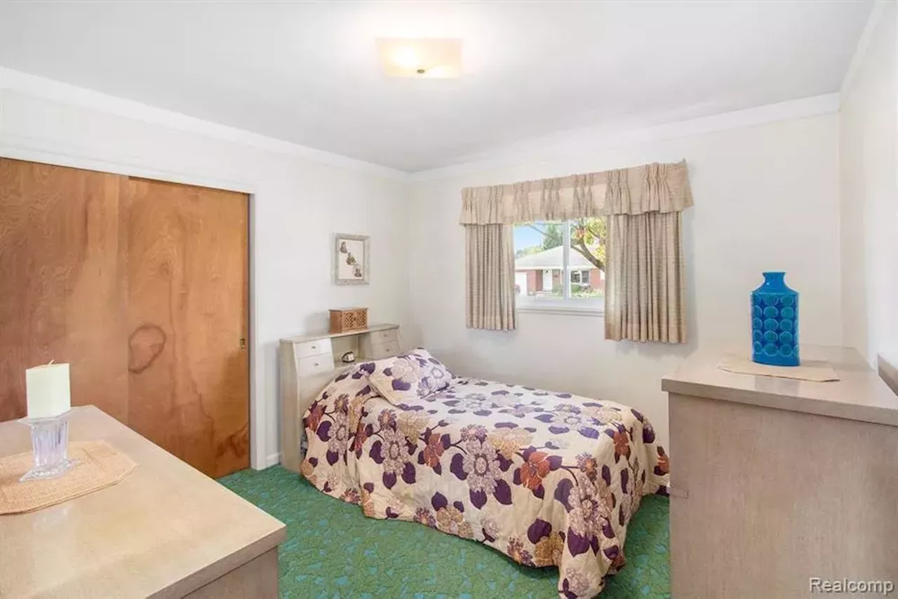 Image: This unassuming $255k St. Clair Shores ranch has a retro basement bar