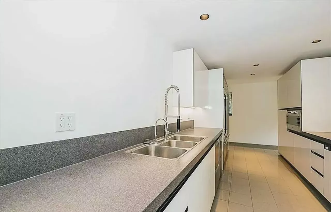 Image: This vertical Franklin Michigan home designed by Sigmund Blum is a modernist's wild dream &#151; and it keeps dropping in price