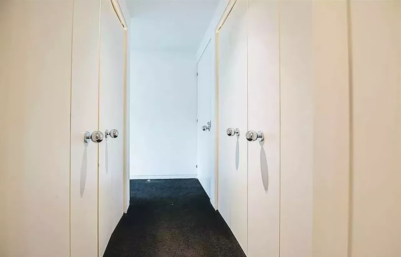 Image: This vertical Franklin Michigan home designed by Sigmund Blum is a modernist's wild dream &#151; and it keeps dropping in price