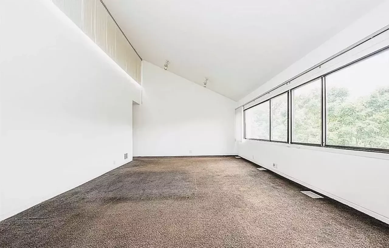 Image: This vertical Franklin Michigan home designed by Sigmund Blum is a modernist's wild dream &#151; and it keeps dropping in price
