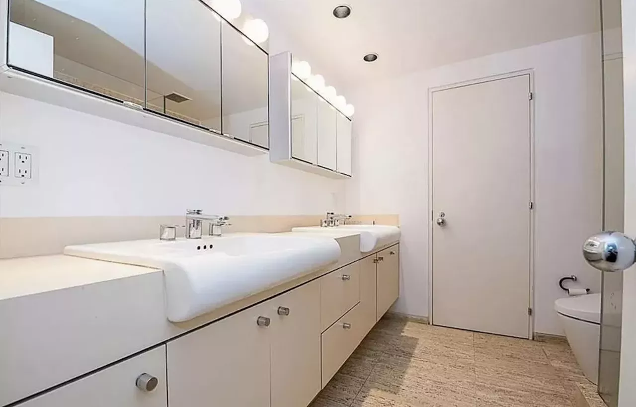 Image: This vertical Franklin Michigan home designed by Sigmund Blum is a modernist's wild dream &#151; and it keeps dropping in price