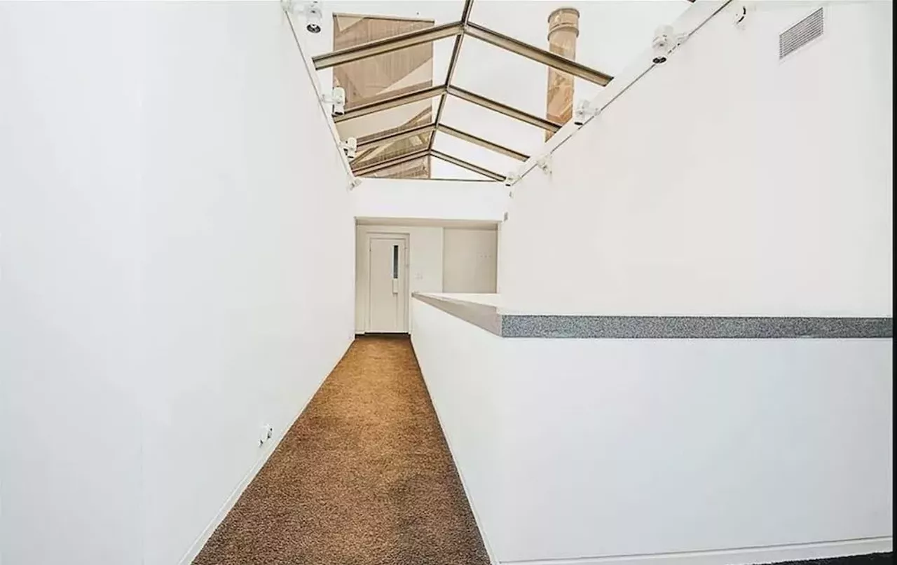 Image: This vertical Franklin Michigan home designed by Sigmund Blum is a modernist's wild dream &#151; and it keeps dropping in price