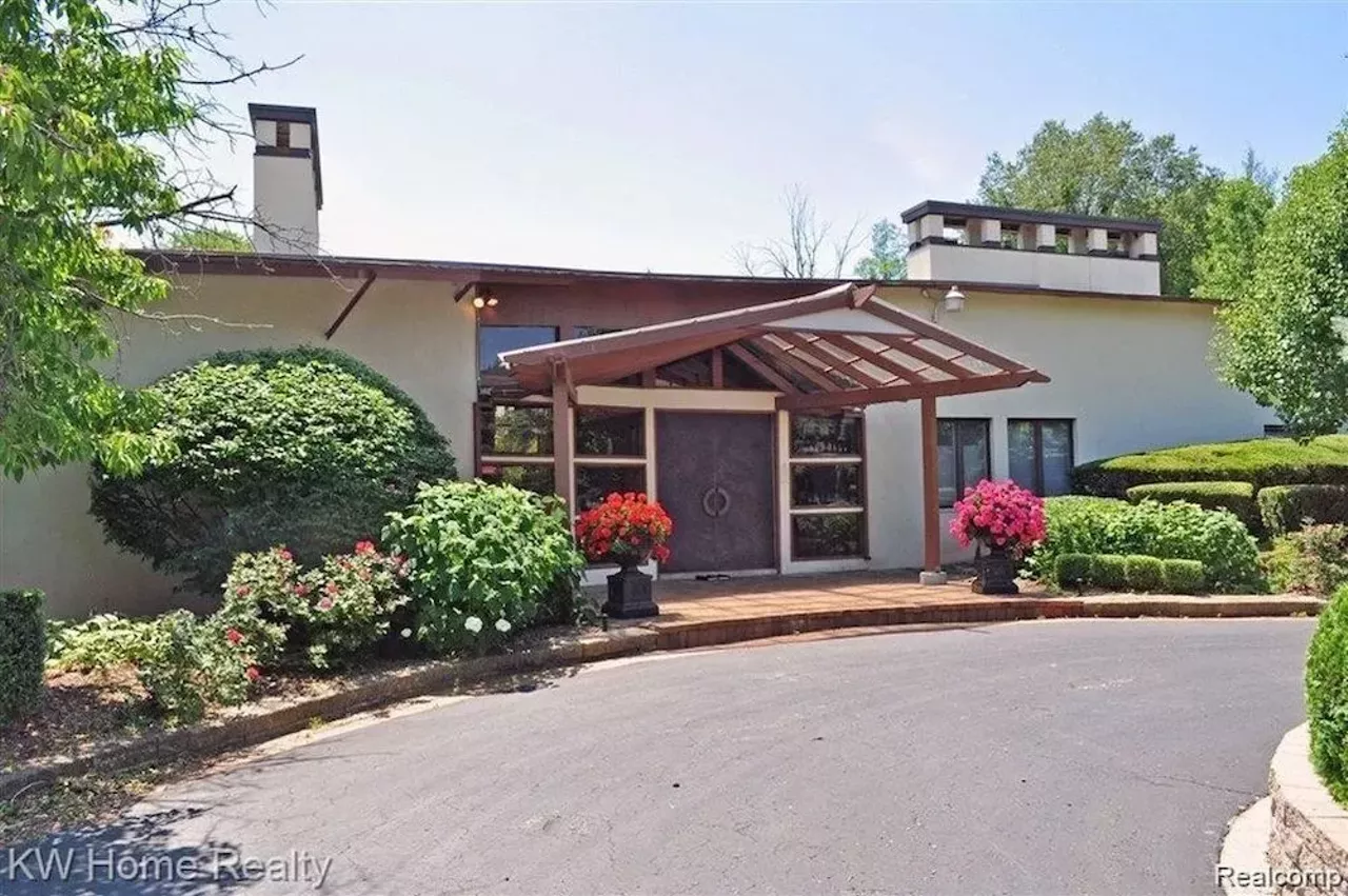 Image: This Wallace Frost-designed home in Bloomfield Hills has Playboy Mansion doors