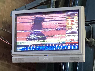 Some of the TV monitors at Comerica Park show freeze frames filled with static.