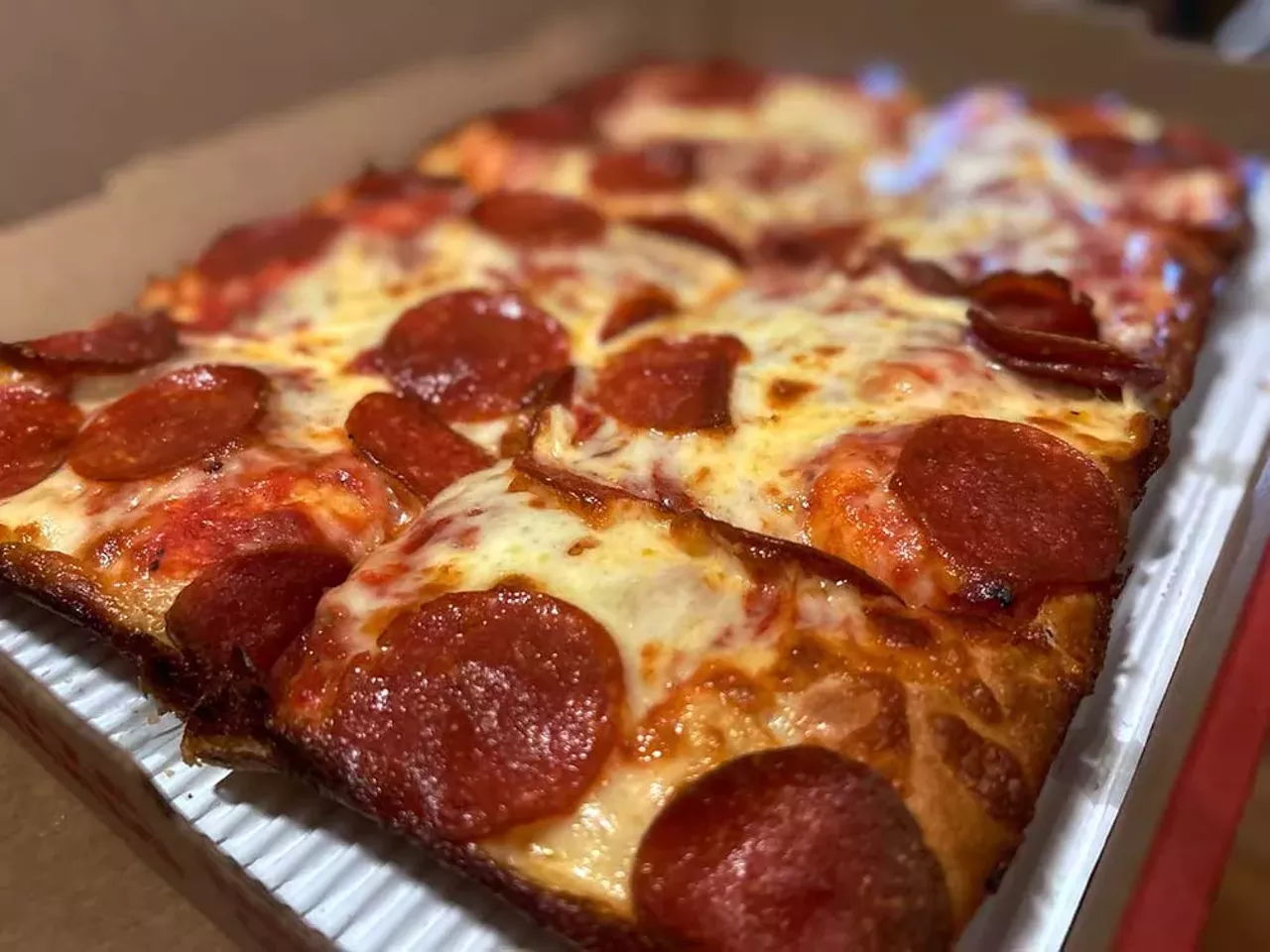#20 Jet’s Pizza Multiple locations; jetspizza.com Jet&rsquo;s might not win over the Detroit-style purists, but it delivers a consistently tasty pizza straight to your doorstep&mdash;and that&rsquo;s tough to top. With over 400 locations nationwide, Jet&rsquo;s is the largest chain specializing in Detroit-style pizza, and when it comes to quality, it far outshines other Michigan-based giants like Little Caesars, Domino&rsquo;s, and Hungry Howie&rsquo;s. The brand takes creative liberties&mdash;placing sauce beneath the cheese and skipping traditional Wisconsin brick&mdash;but while that&rsquo;s a turnoff for some, it&rsquo;s still a flavorful, no-fuss option that beats most major delivery chains by a mile. Jet&rsquo;s doesn&rsquo;t skimp on cheese either. Its mozzarella-Muenster mix melts into gooey perfection with caramelized edges. The sauce is slightly sweet and light, the pepperoni crisps into classic cups, and the crust strikes a satisfying balance between soft and crisp without going soggy.