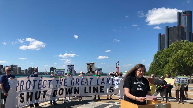 Activists protest Line 5 at 2021 rally along the Detroit River.