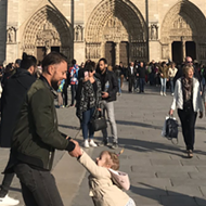 Michigan woman seeking man and girl in viral Notre Dame photo