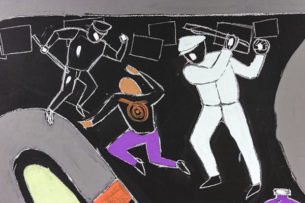 A person with a target on their back is shown being beaten by police in a mural by students at Detroit's Southeastern High School. - MARSHALL SKEETERS, HEIDELBERG PROJECT