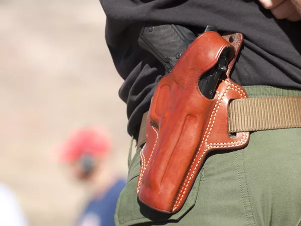 Michigan's state legislature has enacted laws that allow for someone like this to walk into your kid's school. Can local districts make this person GTFO? - Shutterstock