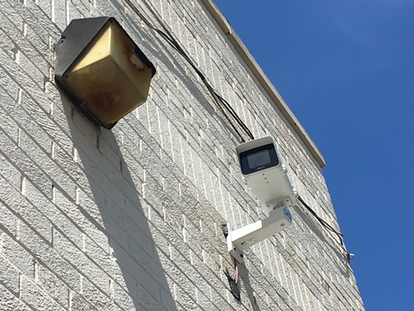 A Project Green Light camera at State Farm Insurance on 7 Mile and Livernois. The real-time crime monitoring program is drawing scrutiny as it expands to Detroit schools. - Violet Ikonomova