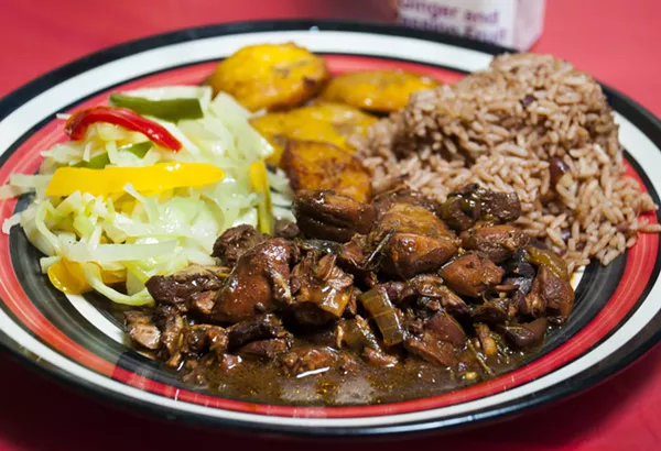 Brown stew chicken at Jamaican Pot. - Tom Perkins