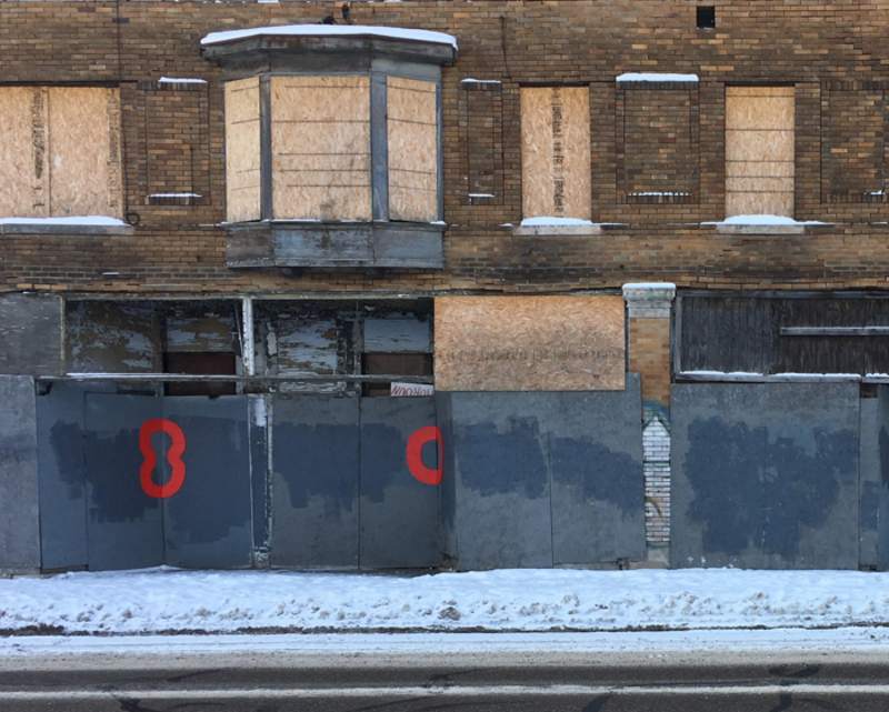 Detroit artist Nick Jaskey's "Red Circles" dot Detroit's derelict buildings. - Courtesy photo