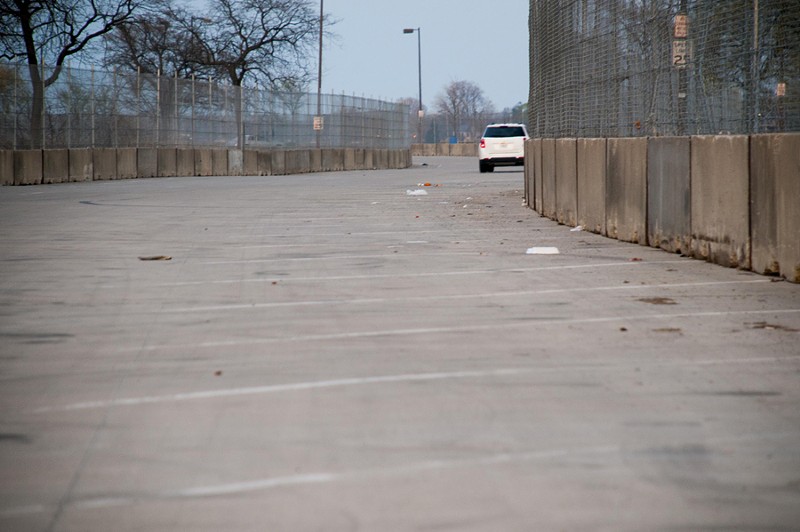 Concrete barricades and fencing on Belle Isle is erected months ahead of the event. - TOM PERKINS