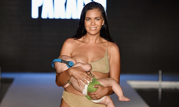 Model from Monroe breastfeeds on runway –  and we are here for it