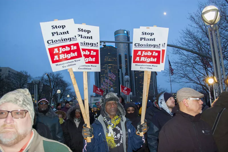 UAW workers hold a candlelight vigil after General Motors announces it will close five North American plants, including Detroit-Hamtramck Assembly. - Lee DeVito