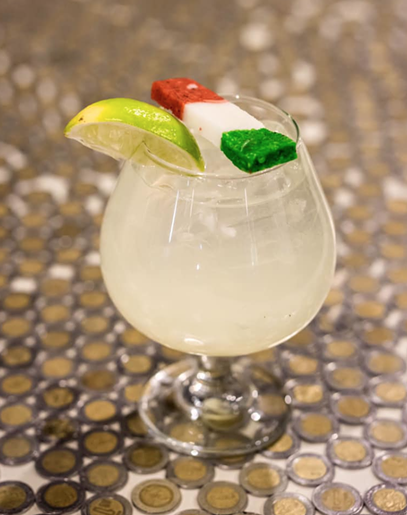 Frida Kahlo (Tequila, Citrus agave blend, coconut water, coconut bandera) - Peso Detroit/Facebook