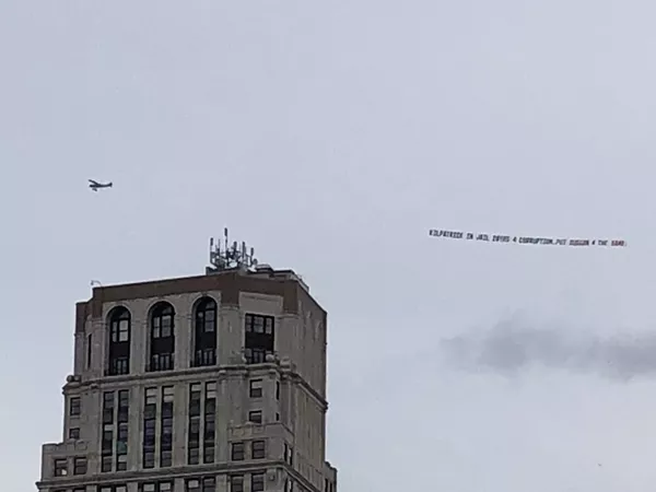 One of two airplane banners targeting Mayor Duggan on Thursday morning. - Steve Neavling