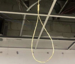 Suspected noose hanging from a ceiling in the lobby of the Detroit Police Department's 11th precinct. - DPD