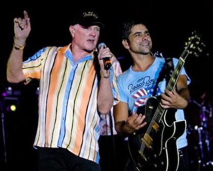 NOTE: John Stamos will not be joining the Beach Boys for their area show... or will he? - GIBSON PROMOTIONAL PHOTO