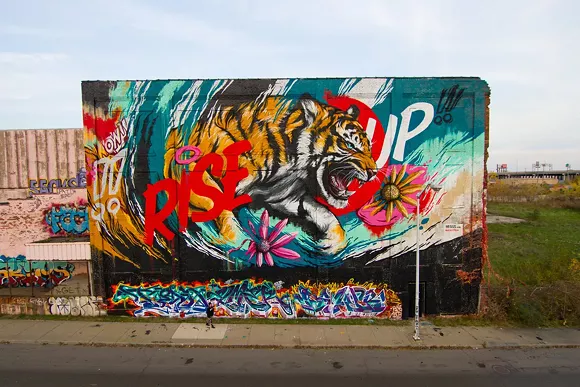 Australian artist Meggs, who painted the above mural in Detroit last fall, kicks off the new Murals In the Market festival with the unveiling of a new painting on Tuesday. - SAL RODRIGUEZ