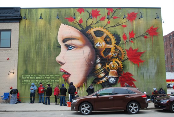 The artist Fel3000ft was commissioned to paint a mural on the side of Detroit's HopCat. - COURTESY PHOTO
