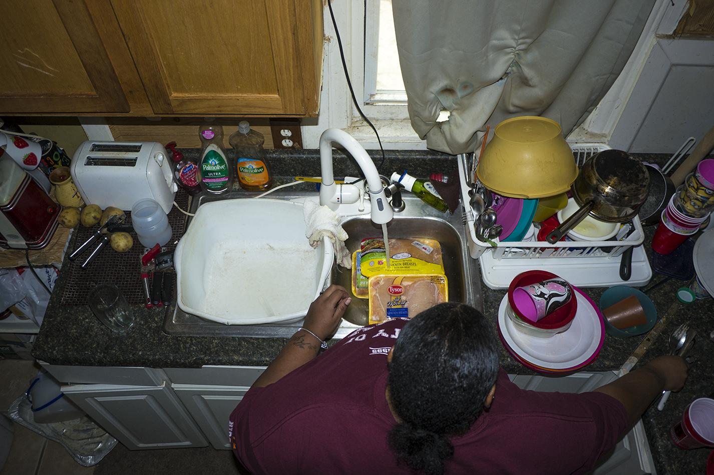 Robertson cooks dinner for her family. - Iain Maitland