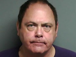 Former Macomb County PR flack charged with child porn possession
