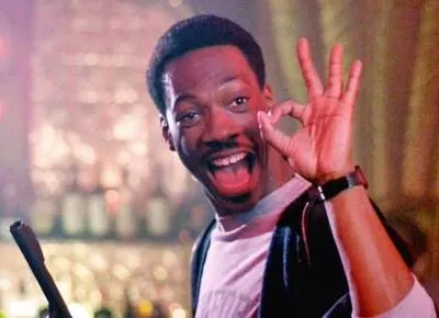 Hell, no, that's not Gil Hill. It's Eddie Murphy. But would you have clicked on it if it were Gil Hill? (Still from "Beverly Hills Cop," 1984, Paramount Pictures)