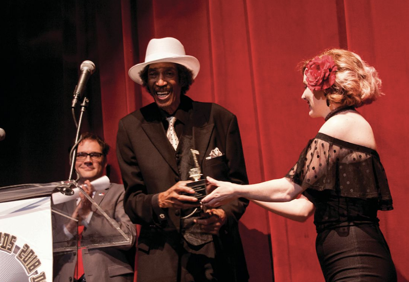 Melvin Davis accepts an award at the 2018 Detroit Music Awards. - Luis G.