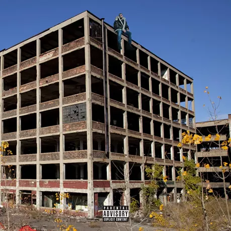 See what Drake looks like sitting on Detroit landmarks